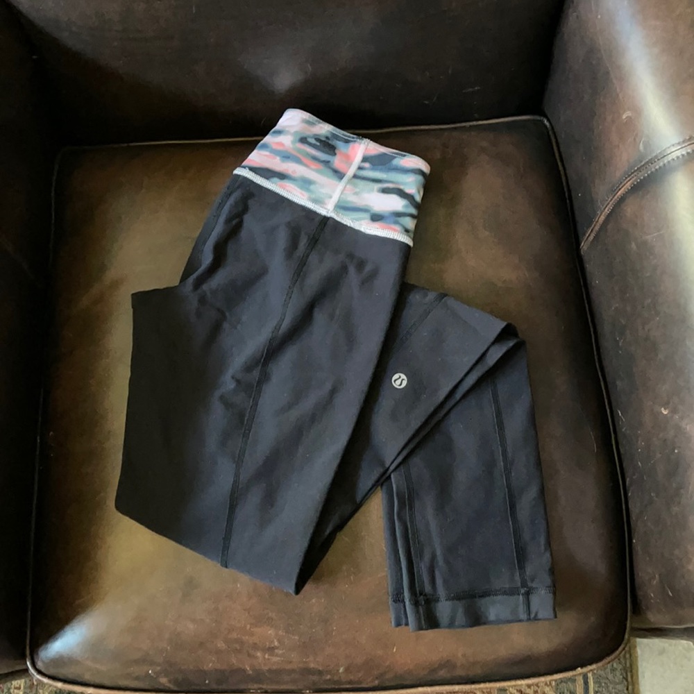 Size 4 black leggings with cute camo waistband. No tears or snags